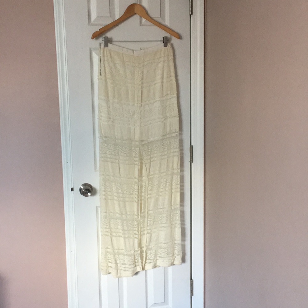 BlueTique white shear lace skirt.